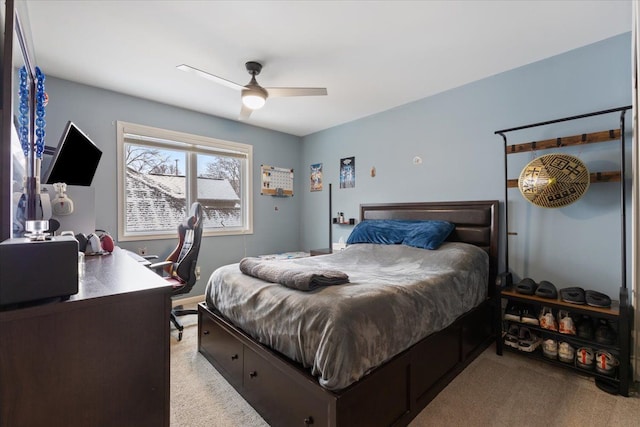 carpeted bedroom with ceiling fan