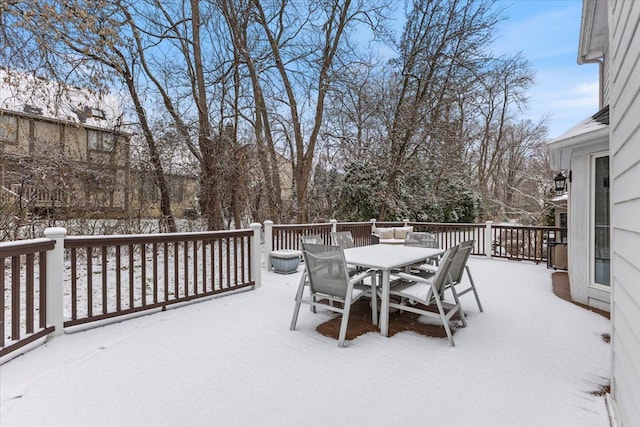 view of snow covered deck