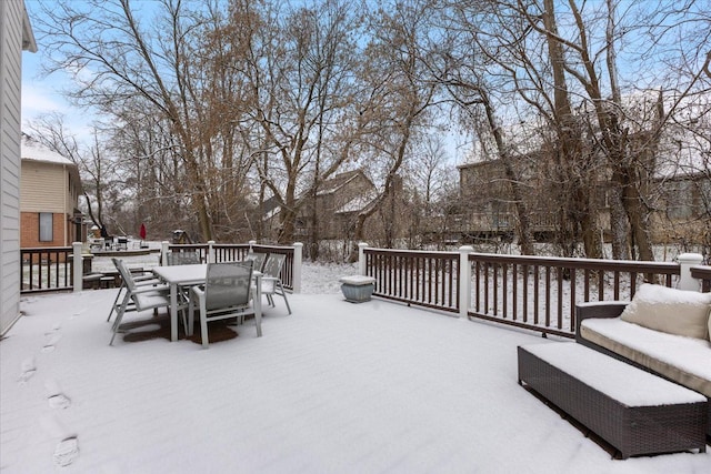 view of snow covered deck