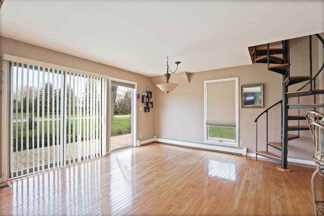 interior space featuring light hardwood / wood-style flooring and a baseboard radiator