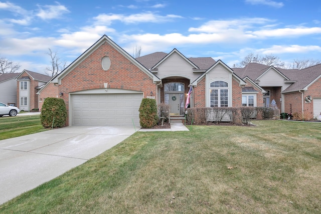 view of front facade featuring a front lawn and a garage