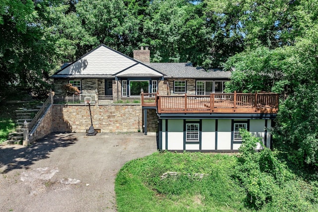 view of front of house featuring a wooden deck