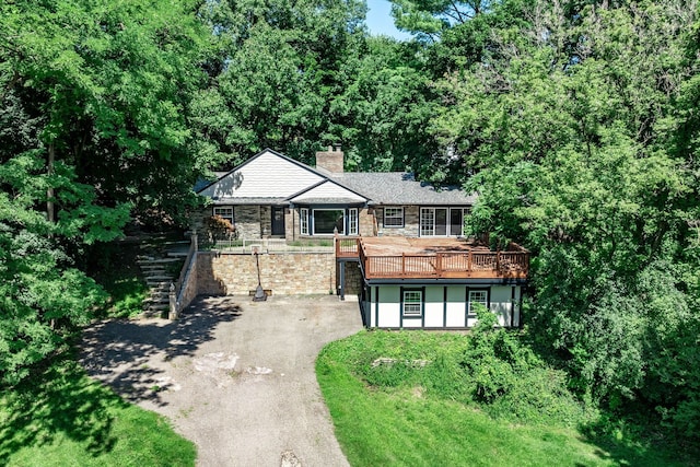 view of front of property featuring a deck