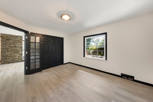 foyer entrance featuring light wood-type flooring