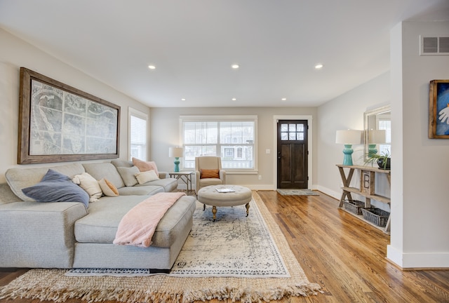 living room featuring light wood-type flooring