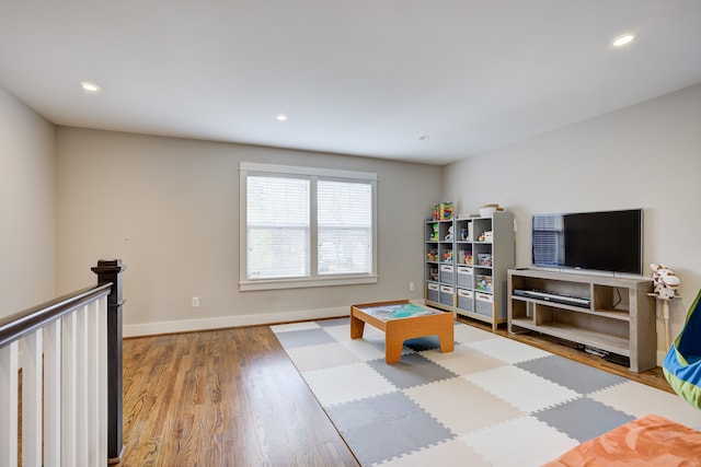 playroom featuring hardwood / wood-style floors