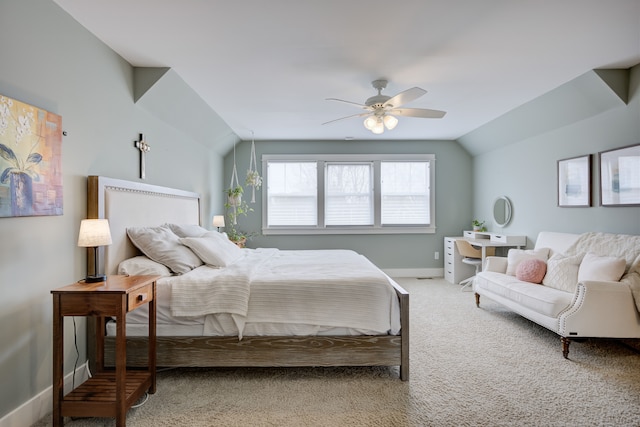 carpeted bedroom with ceiling fan and lofted ceiling