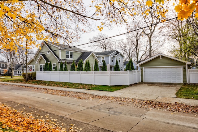 view of front of property with an outbuilding and a garage