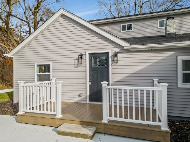 doorway to property featuring a deck