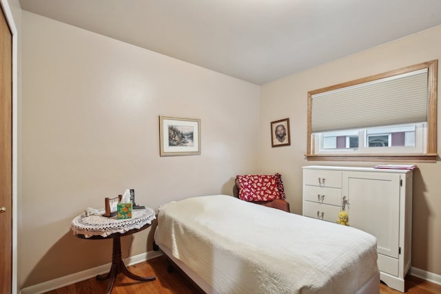 bedroom featuring hardwood / wood-style floors