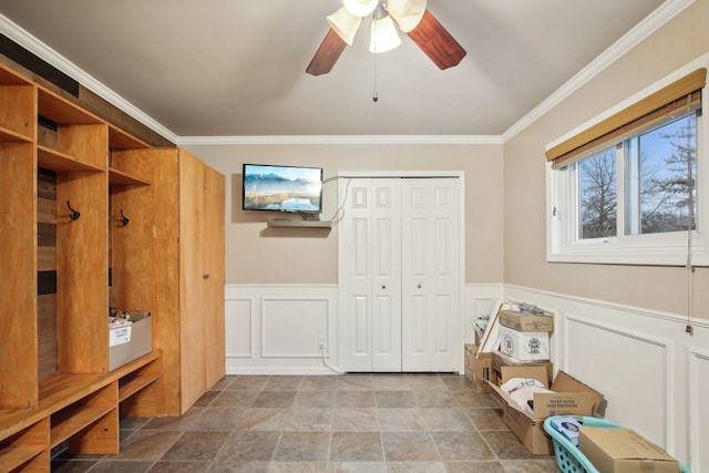 mudroom with ceiling fan and crown molding