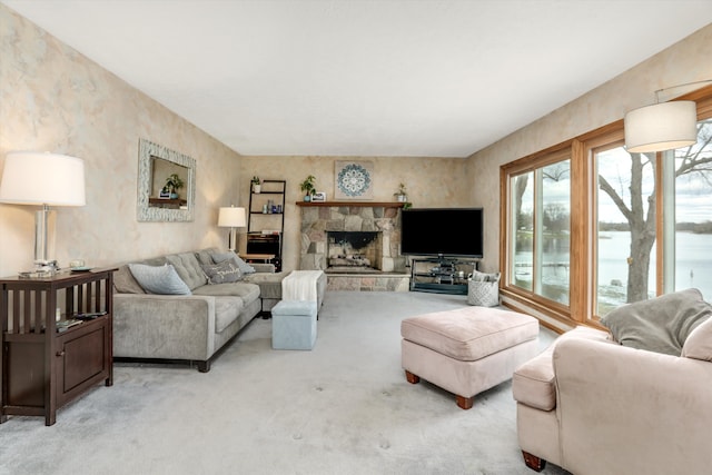 living room with a fireplace and light colored carpet