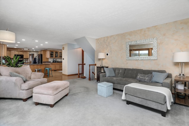 living room featuring light colored carpet