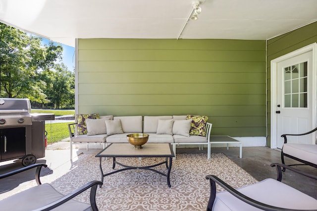 view of patio / terrace featuring an outdoor hangout area and grilling area