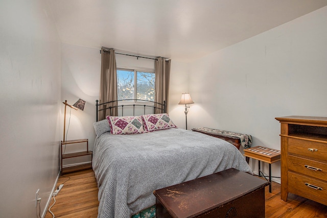 bedroom with light hardwood / wood-style flooring