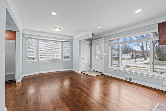 foyer entrance with wood-type flooring