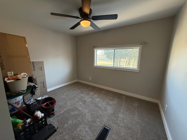 5052 Kenway Ct S, Sterling Heights, MI 48310 - carpeted empty room featuring a ceiling fan and baseboards