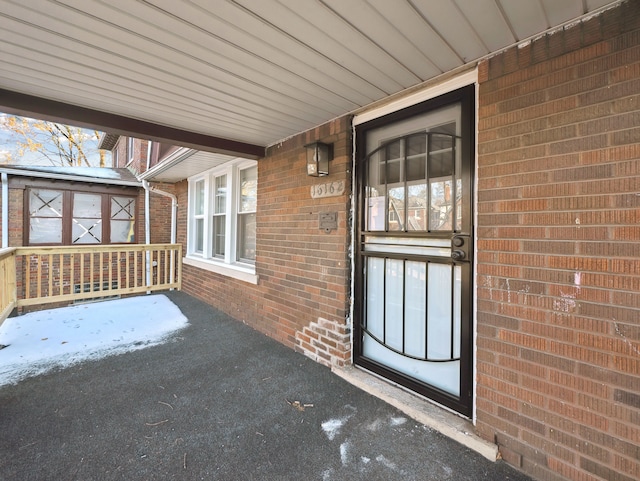 16162 Normandy St, Detroit, MI 48221 - property entrance featuring brick siding and covered porch