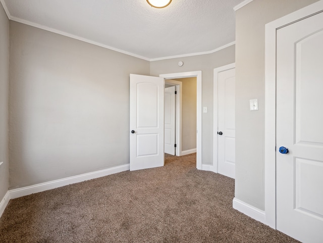 16162 Normandy St, Detroit, MI 48221 - unfurnished bedroom featuring carpet, ornamental molding, baseboards, and a textured ceiling
