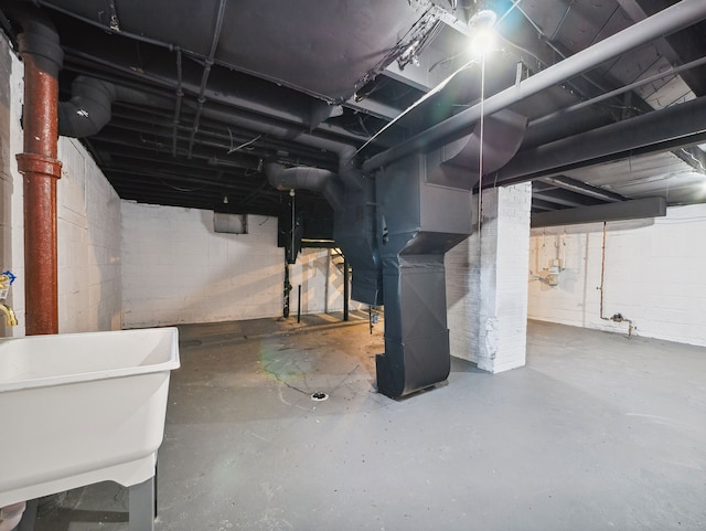 16162 Normandy St, Detroit, MI 48221 - unfinished basement with a sink, gas meter, and heating unit
