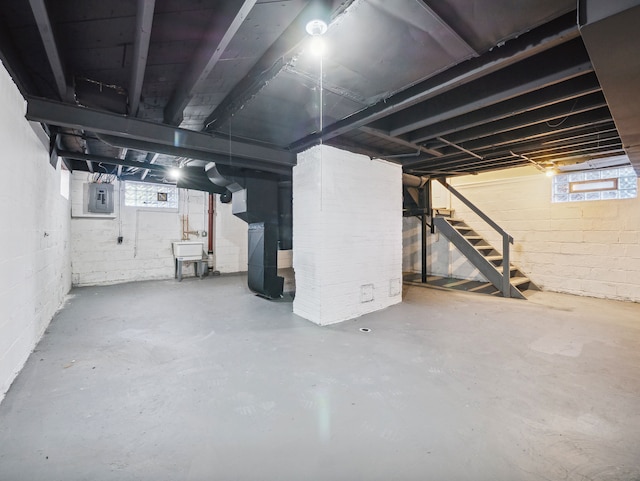16162 Normandy St, Detroit, MI 48221 - below grade area with stairs, electric panel, a sink, and healthy amount of natural light