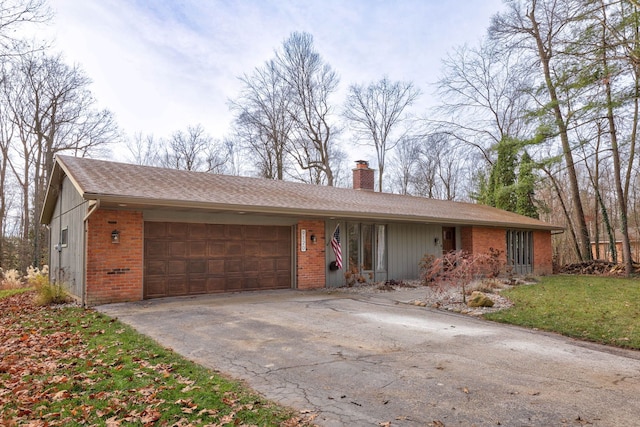 ranch-style home featuring a garage