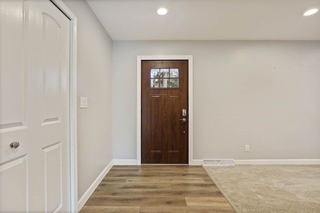 entrance foyer featuring hardwood / wood-style floors