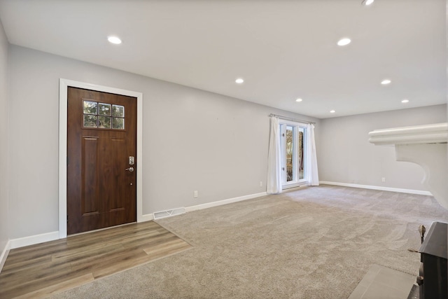 foyer with hardwood / wood-style floors