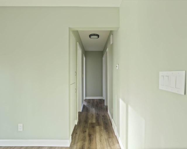 corridor featuring hardwood / wood-style flooring