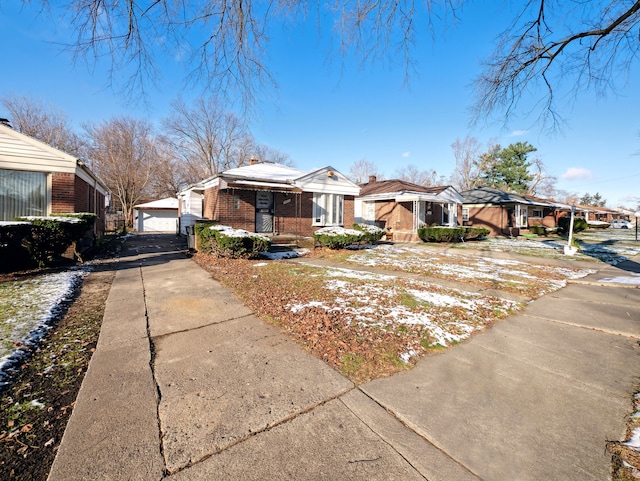 20019 Westbrook St, Detroit, MI 48219 - view of front facade featuring brick siding, a residential view, and a garage
