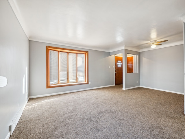 20019 Westbrook St, Detroit, MI 48219 - empty room featuring a ceiling fan, carpet, baseboards, and crown molding