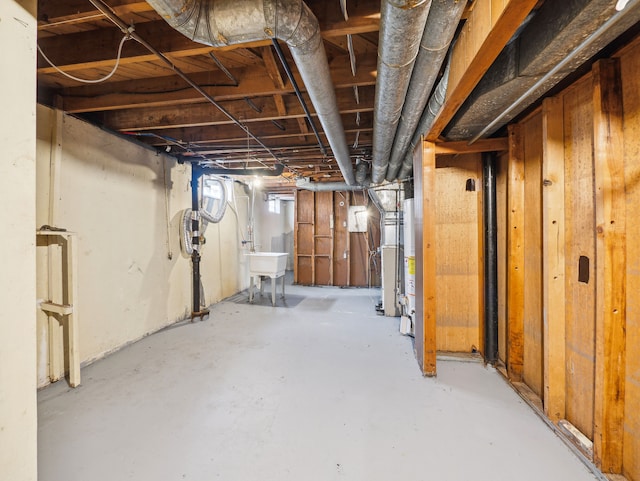 20019 Westbrook St, Detroit, MI 48219 - basement featuring a sink and water heater