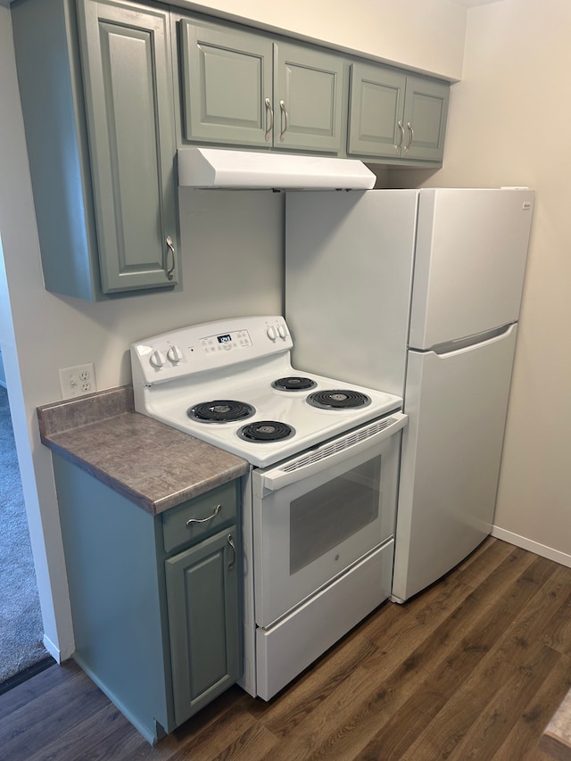 kitchen with white electric range and dark wood-type flooring