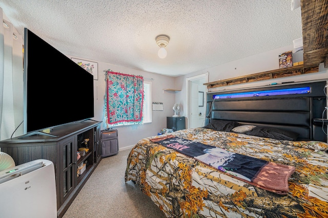 carpeted bedroom with a textured ceiling