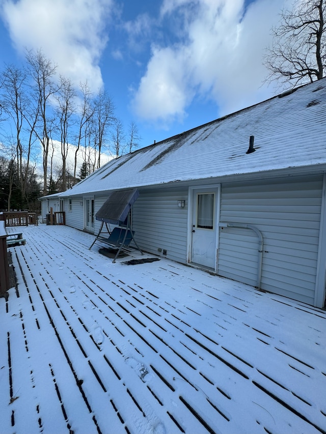 view of snow covered deck