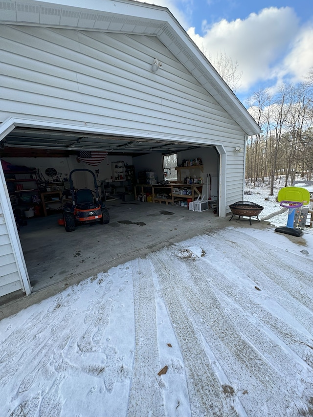 view of snow covered garage