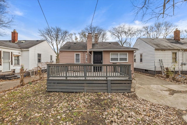 rear view of house with a deck