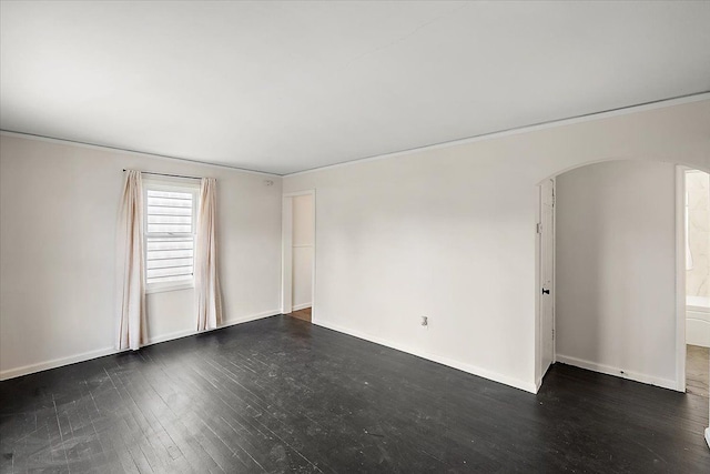 empty room featuring dark hardwood / wood-style floors