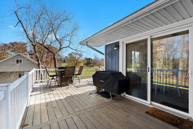 wooden terrace with grilling area