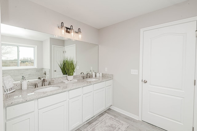 bathroom featuring hardwood / wood-style floors and vanity