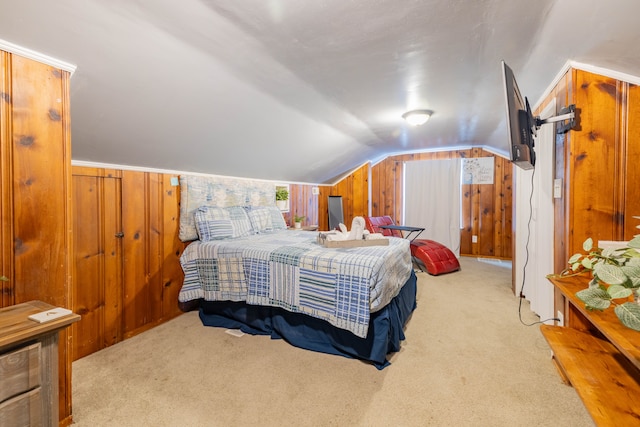 bedroom featuring light carpet, lofted ceiling, and wood walls