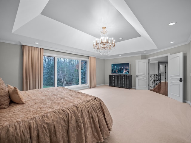 carpeted bedroom featuring a raised ceiling, crown molding, and a notable chandelier