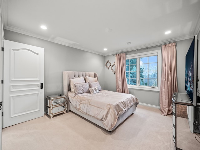 carpeted bedroom featuring crown molding