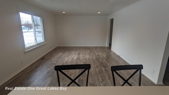 empty room featuring hardwood / wood-style floors