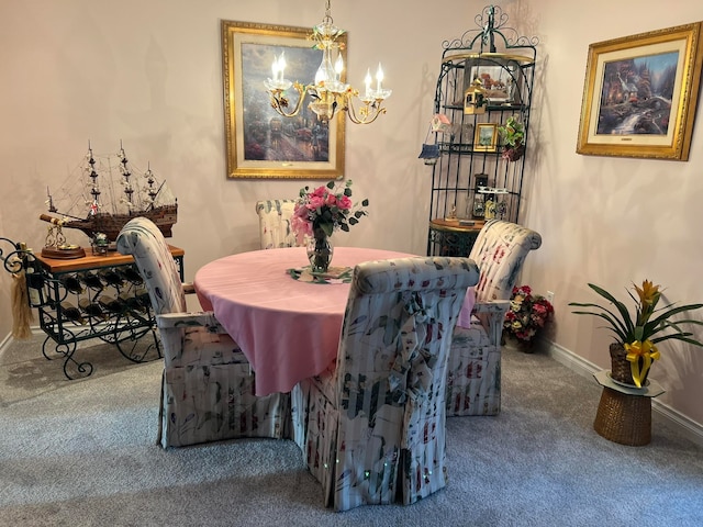 dining area featuring carpet and a notable chandelier