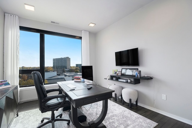 home office featuring dark hardwood / wood-style floors