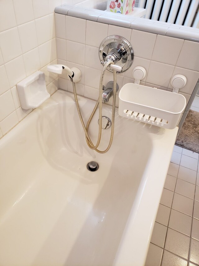 bathroom with tile patterned floors