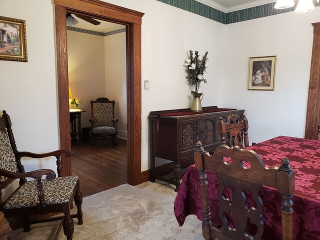 carpeted bedroom featuring crown molding