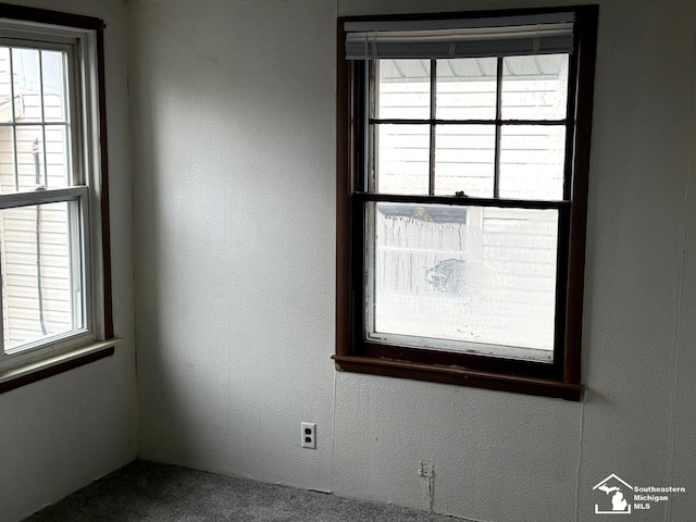 empty room featuring carpet floors