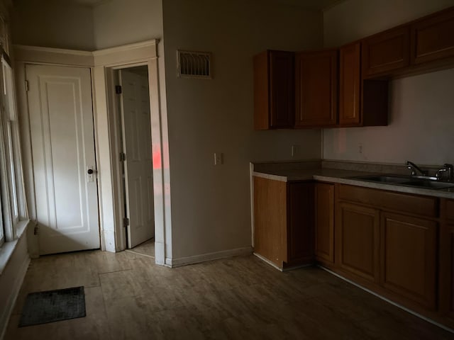 kitchen featuring sink and light hardwood / wood-style floors